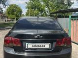 Chevrolet Cruze 2010 годаүшін3 684 419 тг. в Караганда – фото 3