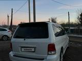 Kia Carnival 2002 года за 2 300 000 тг. в Алматы – фото 2