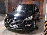 Hyundai Santa Fe 2013 года за 9 800 000 тг. в Караганда