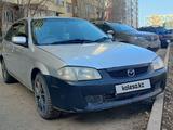 Mazda Familia 2000 года за 1 500 000 тг. в Астана – фото 4