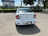 Renault Logan 2015 года за 2 800 000 тг. в Уральск – фото 4