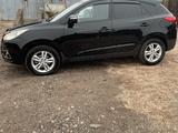 Hyundai Tucson 2012 годаүшін7 500 000 тг. в Караганда – фото 2