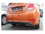 Бампер задний оранжевого цвета Hyundai Accent 14-17 за 32 000 тг. в Алматы