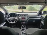 Kia Rio 2013 года за 4 000 000 тг. в Астана – фото 2