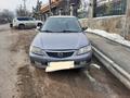 Mazda 323 2002 года за 2 550 000 тг. в Алматы – фото 4