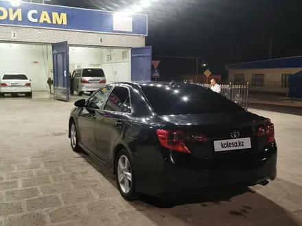 Toyota Camry 2012 года за 7 800 000 тг. в Жанаозен – фото 3