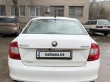Skoda Rapid 2014 года за 3 650 000 тг. в Актобе – фото 4