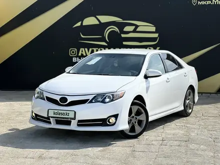 Toyota Camry 2013 года за 8 900 000 тг. в Атырау