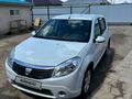 Renault Sandero 2012 года за 3 500 000 тг. в Атырау – фото 2