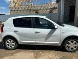 Renault Sandero 2012 года за 3 500 000 тг. в Атырау – фото 4