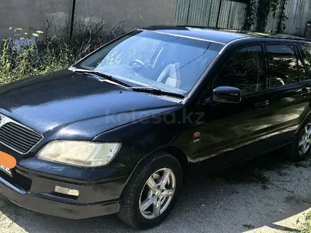 Mitsubishi Lancer 2001 года за 1 300 000 тг. в Алматы – фото 2