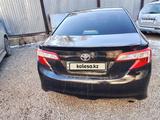 Toyota Camry 2014 годаүшін7 500 000 тг. в Актобе – фото 4