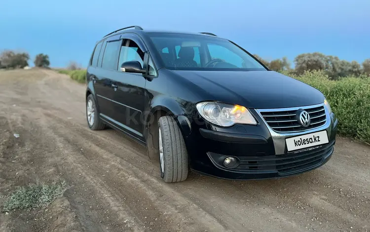 Volkswagen Touran 2007 года за 3 800 000 тг. в Караганда