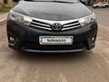 Toyota Corolla 2014 годаүшін8 550 000 тг. в Караганда – фото 2