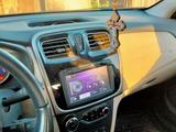 Renault Logan 2015 года за 2 650 000 тг. в Усть-Каменогорск – фото 3