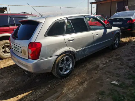 Mazda 323 2003 года за 2 000 000 тг. в Шамалган – фото 7