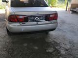 Mazda 323 1996 года за 650 000 тг. в Шымкент – фото 2