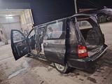 Kia Carnival 1999 года за 1 200 000 тг. в Шымкент