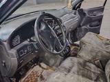 Kia Carnival 1999 года за 1 200 000 тг. в Шымкент – фото 4