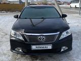 Toyota Camry 2014 года за 9 900 000 тг. в Атырау