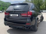 BMW X5 2016 года за 19 450 000 тг. в Алматы – фото 4