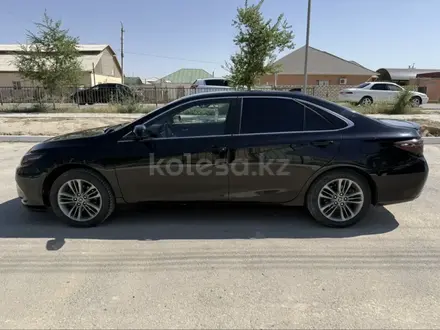 Toyota Camry 2015 года за 6 000 000 тг. в Жанаозен – фото 4