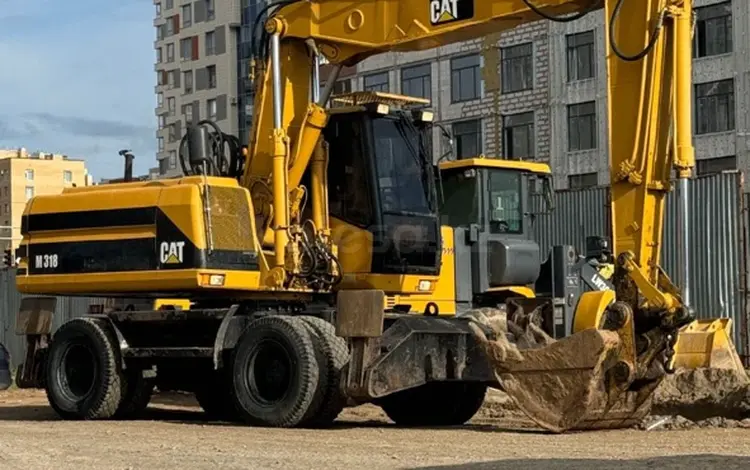 Caterpillar  318 2000 года за 9 000 000 тг. в Астана