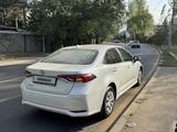 Toyota Corolla 2021 года за 8 900 000 тг. в Алматы – фото 2