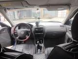 Mazda 323 2001 года за 1 280 000 тг. в Алматы – фото 3