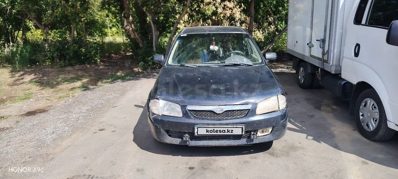 Mazda 323, 1999