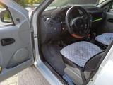 Renault Logan 2007 года за 1 630 769 тг. в Атырау – фото 2