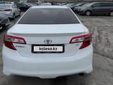 Toyota Camry 2013 года за 6 500 000 тг. в Актобе – фото 4