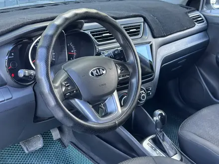Kia Rio 2014 года за 4 900 000 тг. в Актобе – фото 13