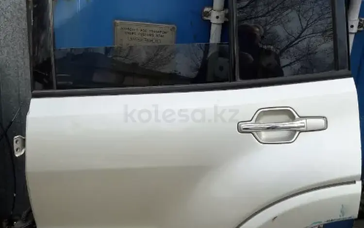 Дверь задняя левая на мицубиси паджеро 2005г за 40 000 тг. в Алматы