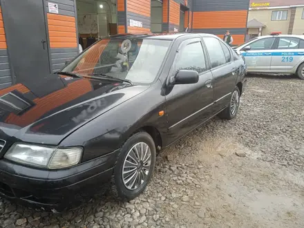 Nissan Primera 1997 года за 1 100 000 тг. в Актобе – фото 4