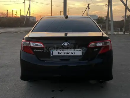 Toyota Camry 2012 года за 8 200 000 тг. в Жанаозен – фото 4