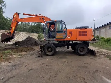 Услуги колесного экскаватора Хитачи в Актобе