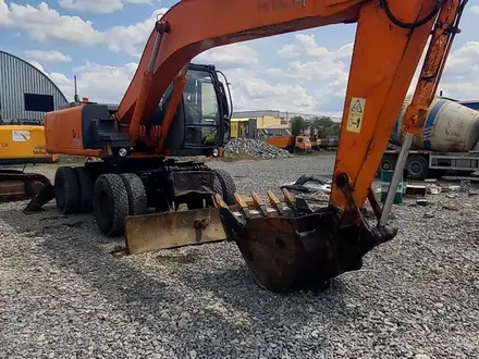 Услуги колесного экскаватора Хитачи в Актобе