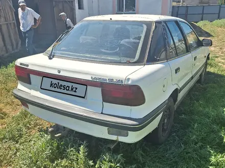 Mitsubishi Lancer 1990 года за 550 000 тг. в Уральск – фото 3