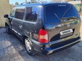 Hyundai Trajet 2001 года за 2 000 000 тг. в Актобе – фото 4