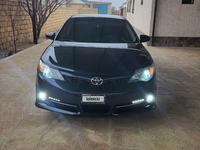 Toyota Camry 2014 года за 6 600 000 тг. в Жанаозен