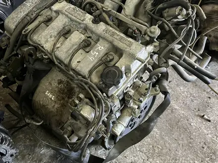 Двигатель на Mazda 2.0 FS трамблер 626 кронус за 370 000 тг. в Караганда – фото 4
