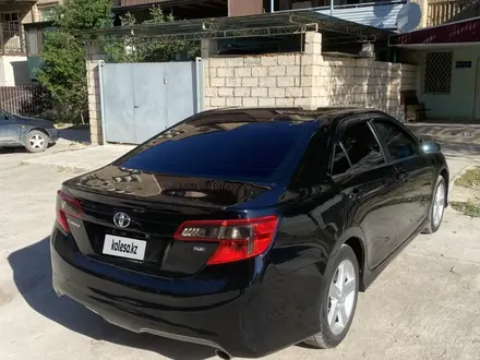 Toyota Camry 2013 года за 6 000 000 тг. в Жанаозен – фото 2