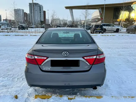 Toyota Camry 2017 года за 9 900 000 тг. в Астана – фото 4