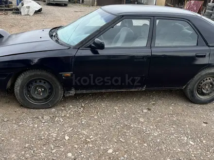 Mazda 323 1993 года за 930 000 тг. в Алматы – фото 2