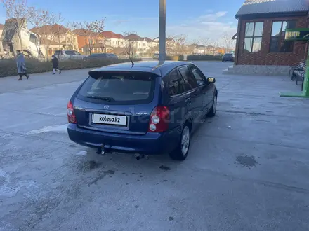 Mazda 323 2002 года за 2 300 000 тг. в Актау – фото 3