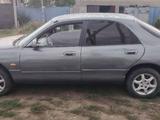 Mazda 626 1994 года за 600 000 тг. в Астана – фото 4