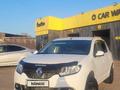 Renault Sandero 2014 годаүшін3 800 000 тг. в Караганда