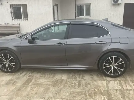Toyota Camry 2019 года за 13 000 000 тг. в Жанаозен