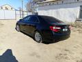 Toyota Camry 2014 года за 4 800 000 тг. в Кульсары – фото 3